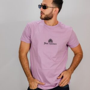 man in pink crew neck t-shirt wearing black sunglasses